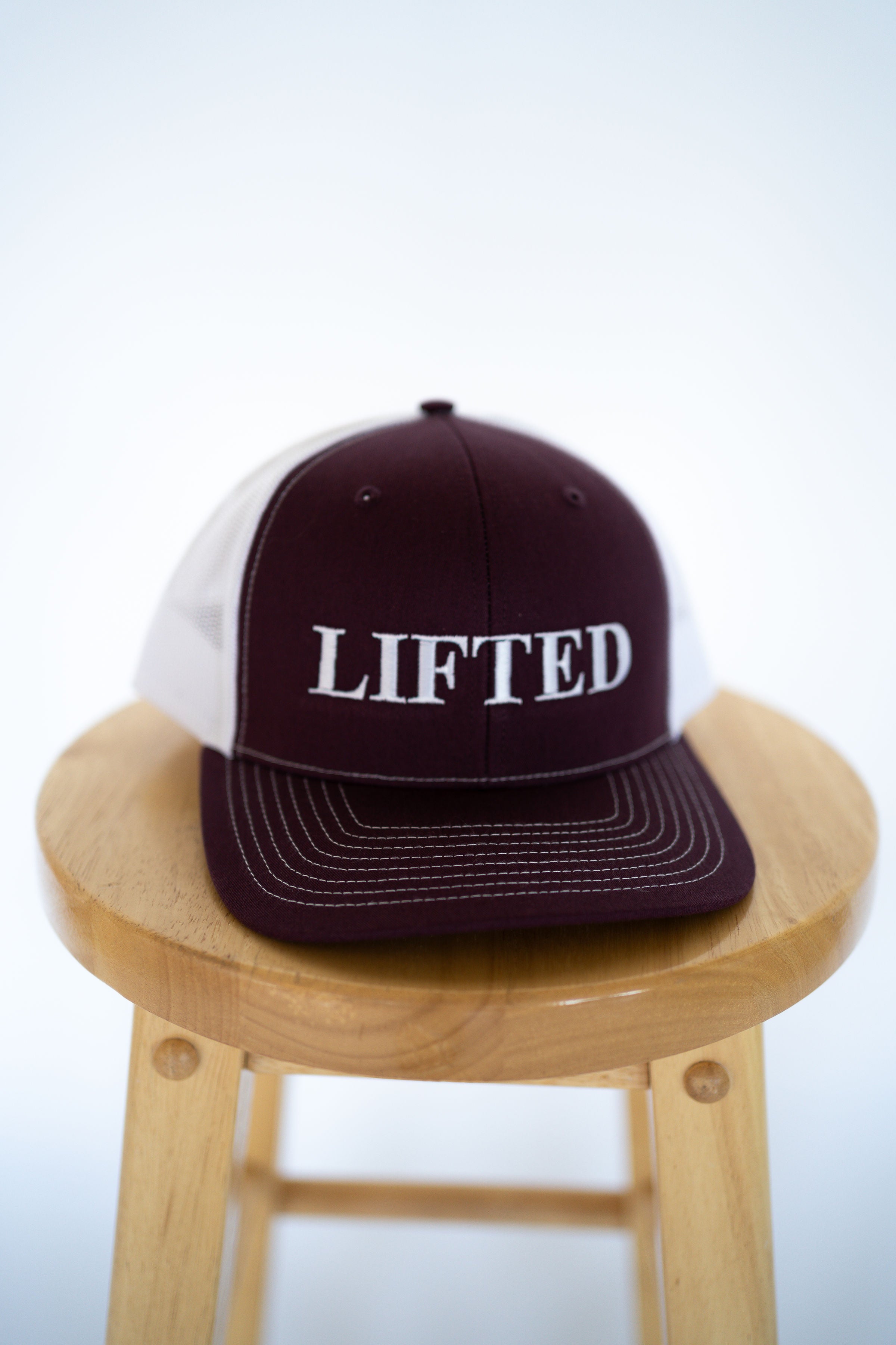 Burgundy/White Trucker Style Hat with Lifted Logo